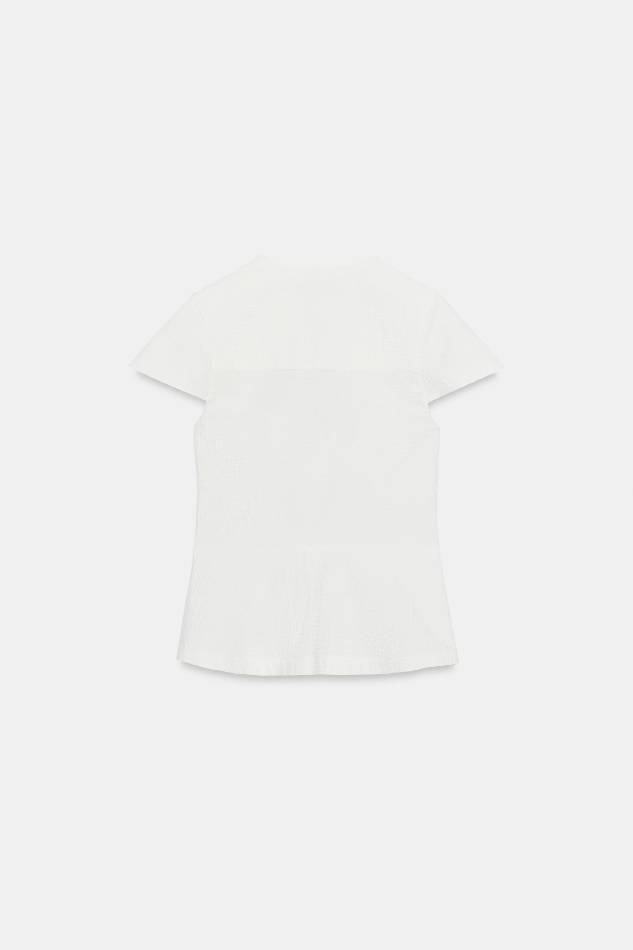 BOW CUT-OUT TOP